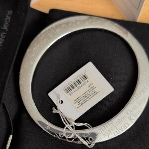 Calvin Klein Silver-Tone Logo Bangle Bracelet